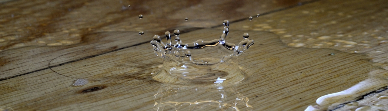 Drop of water on the floor from water damage